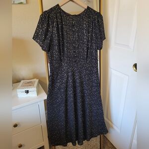 Collectif black dress with gold star print Size M